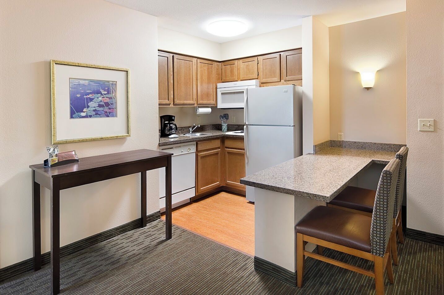 microwave, stovetop, dishwasher, coffee/tea maker