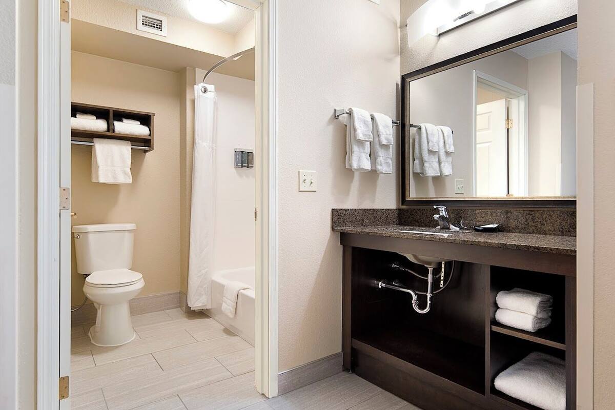 family suite | bathroom | hair dryer, towels