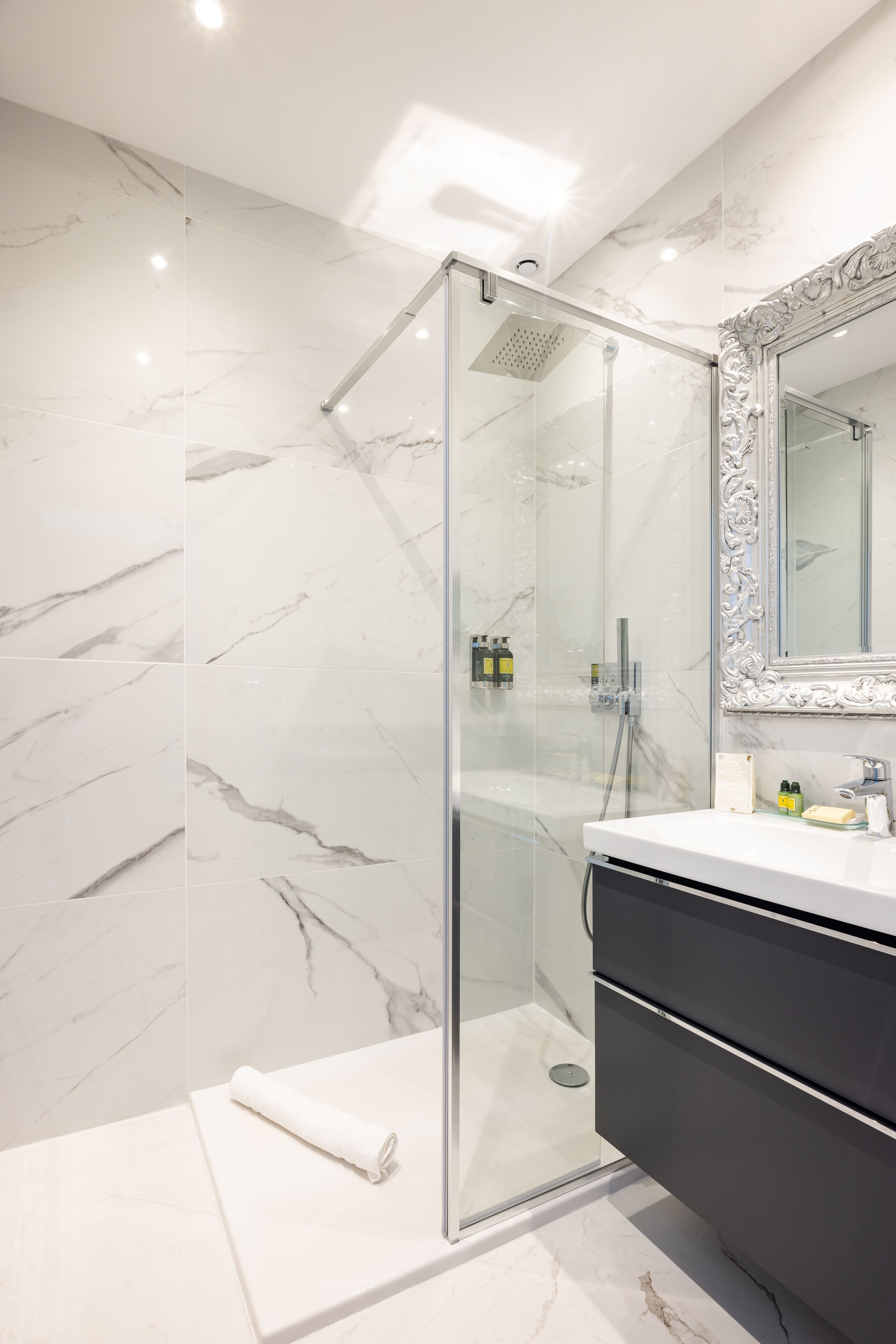 hair dryer, bathrobes, slippers, towels