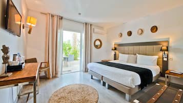 Comfort tweepersoonskamer, bijgebouw | Een minibar, een kluis op de kamer, gratis wifi