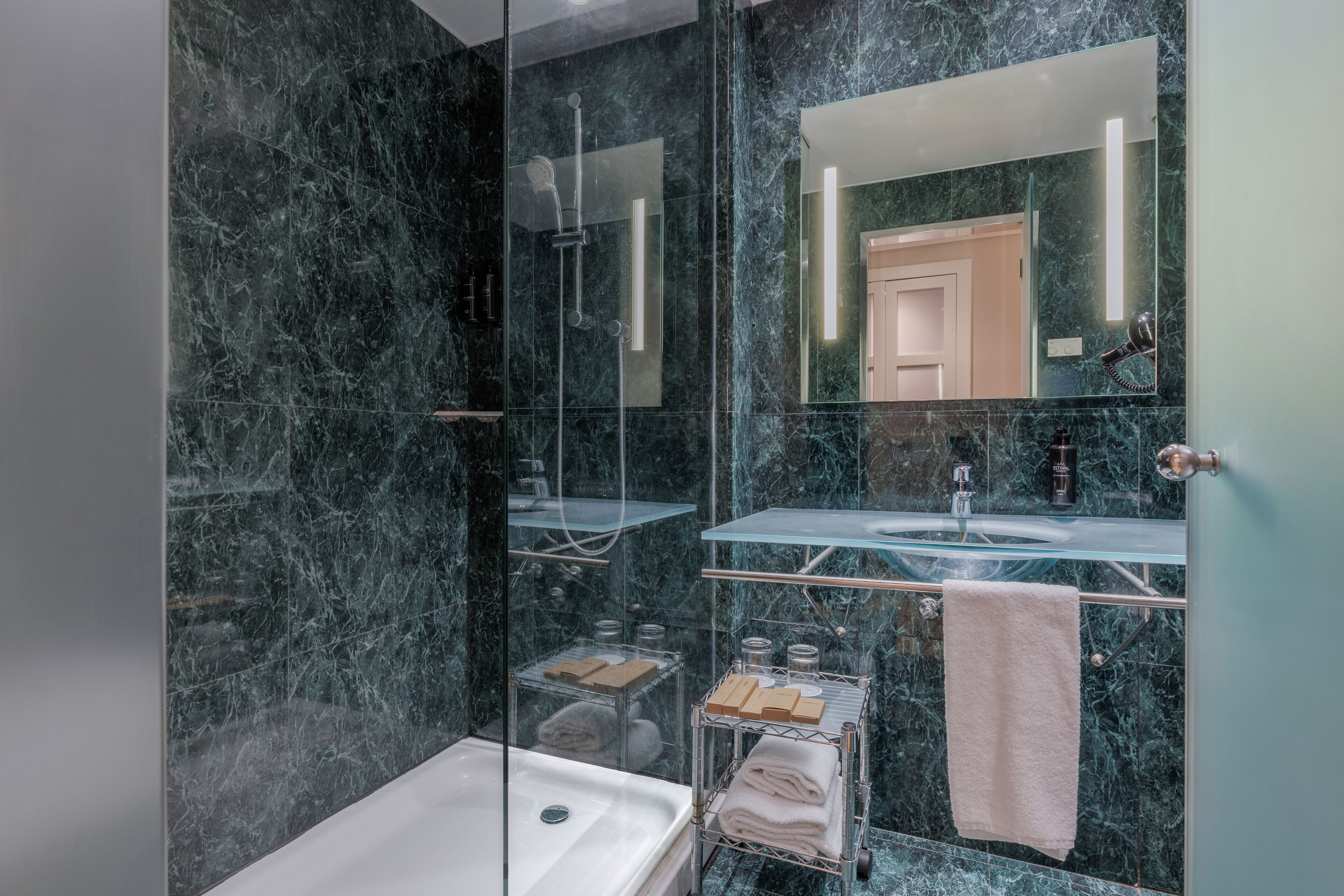 free toiletries, hair dryer, towels, soap