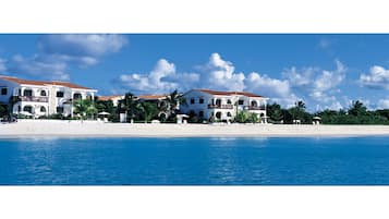 A la platja, platja de sorra blanca i gandules de platja