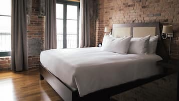 Premium bedding, down comforters, minibar, in-room safe