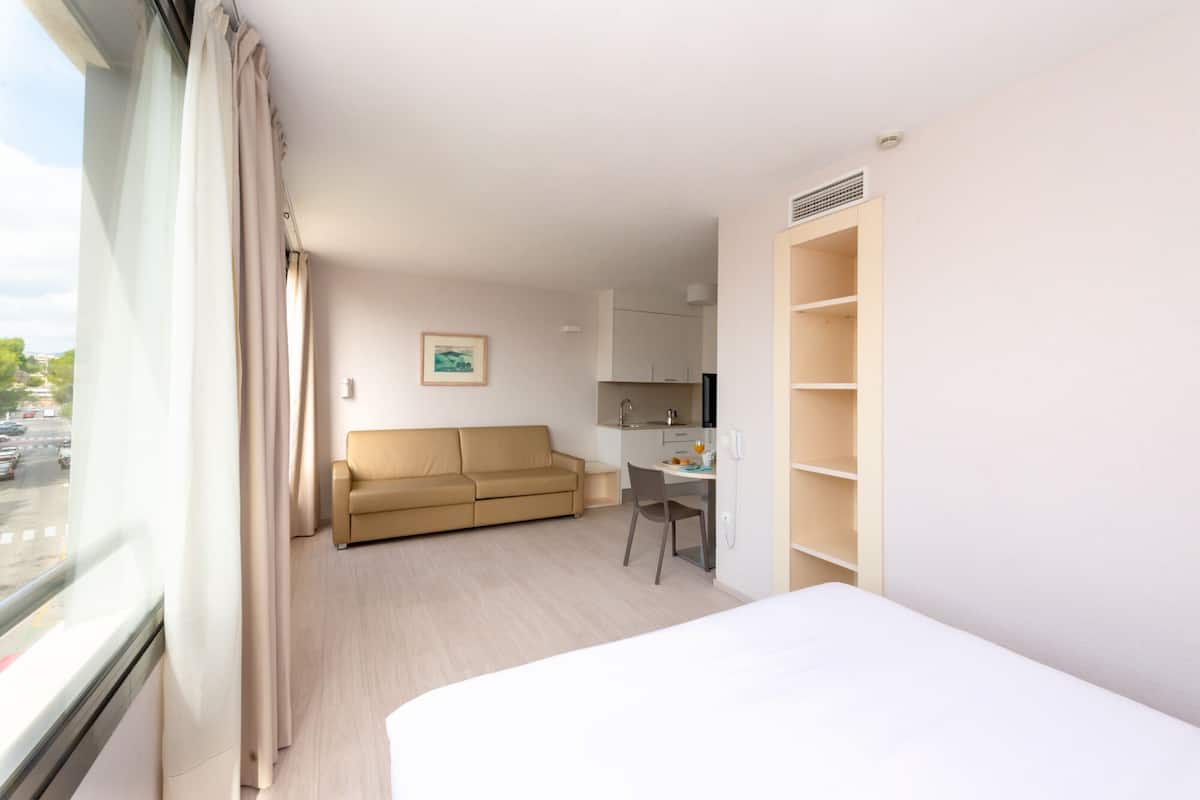 In-room safe, desk, laptop workspace, blackout curtains