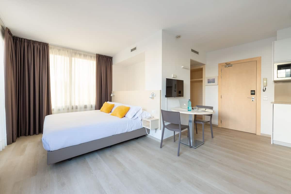 In-room safe, desk, laptop workspace, blackout curtains