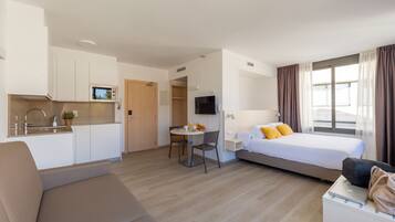 Fridge, microwave, stovetop, coffee/tea maker