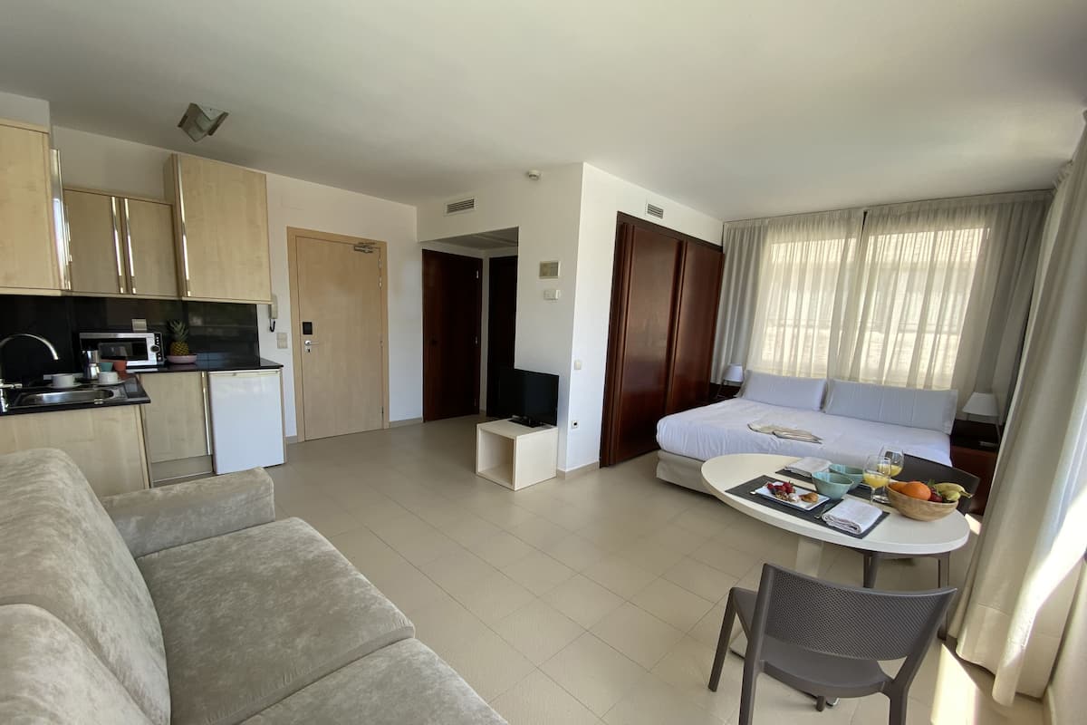 In-room safe, desk, laptop workspace, blackout curtains