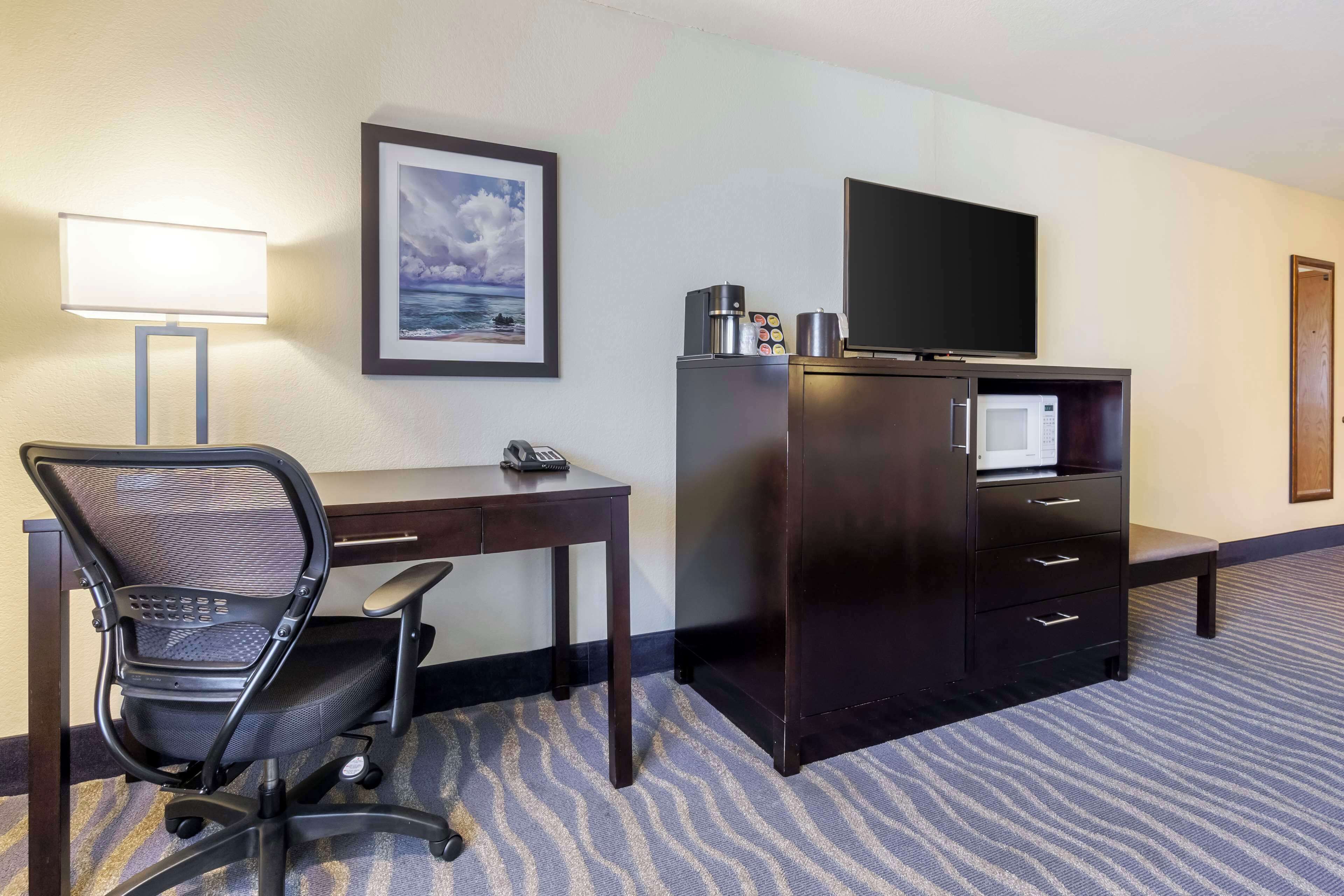 premium bedding, pillow-top beds, desk, blackout curtains