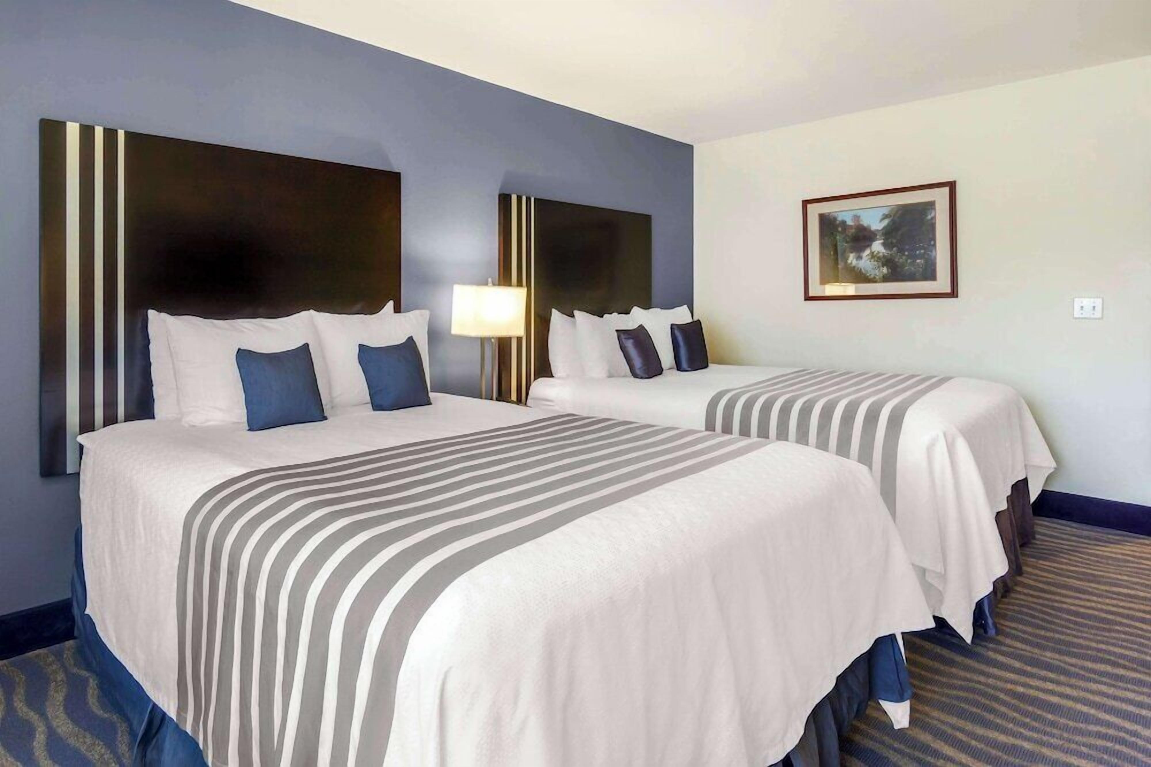 Premium bedding, pillowtop beds, desk, laptop workspace
