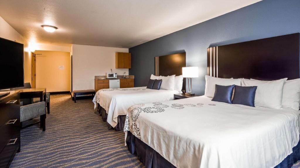 Premium bedding, pillowtop beds, desk, laptop workspace