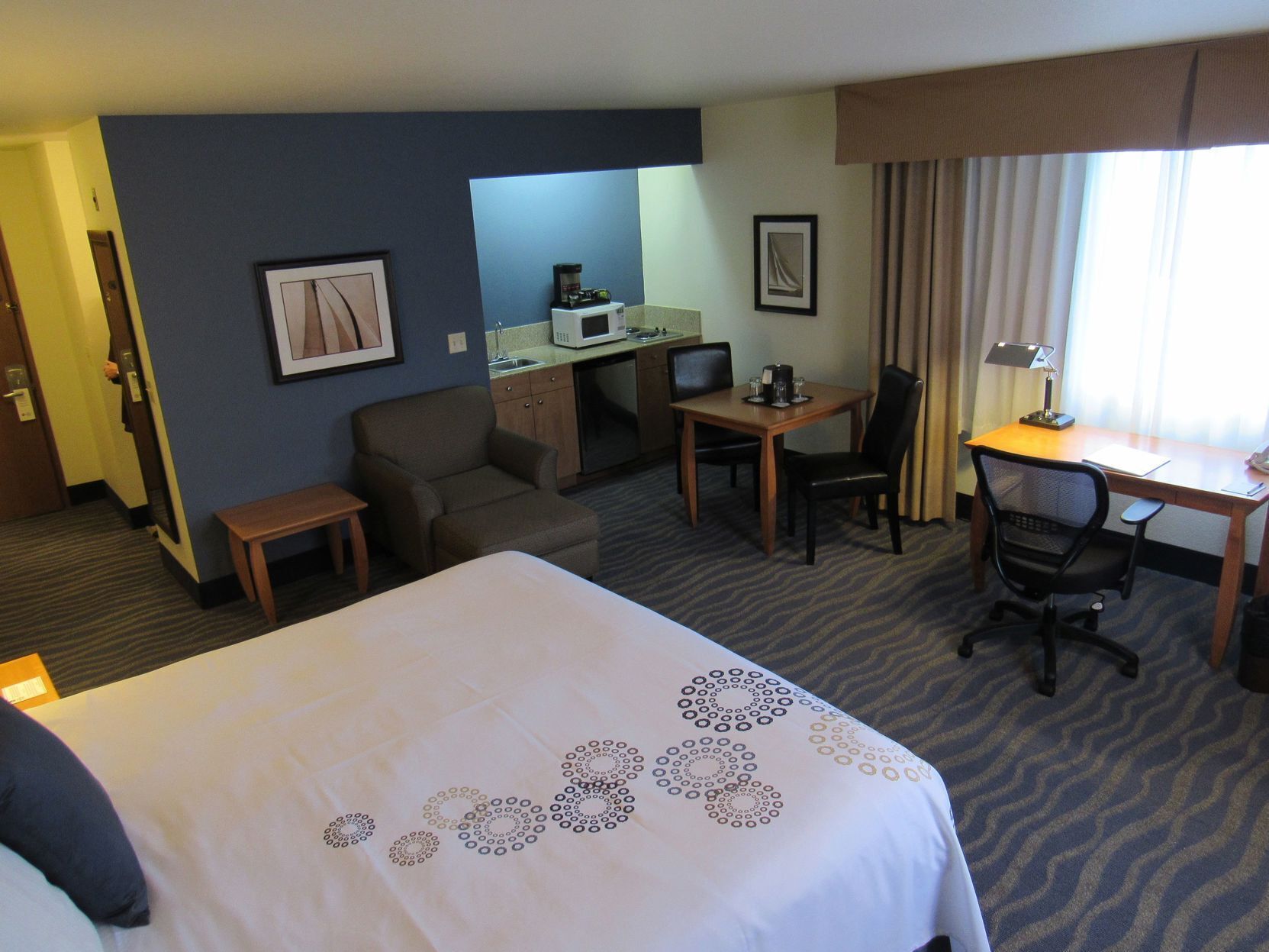 Premium bedding, pillowtop beds, desk, laptop workspace