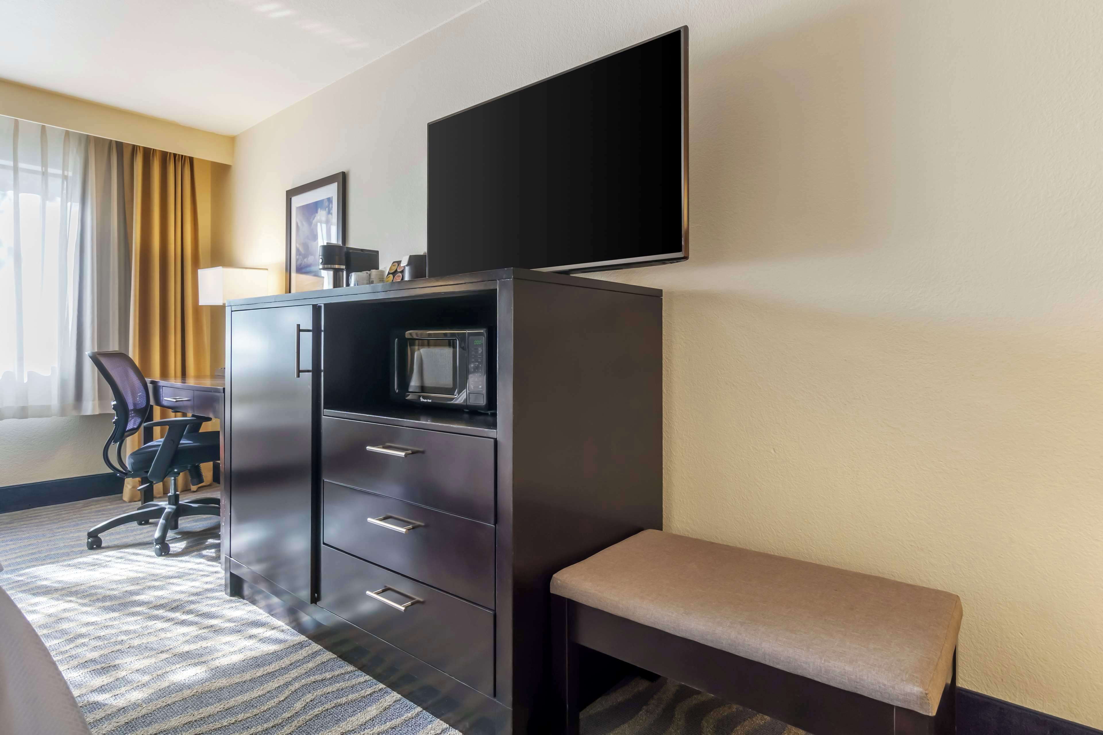 premium bedding, pillow-top beds, desk, blackout curtains