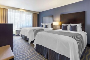 Premium bedding, pillowtop beds, desk, laptop workspace