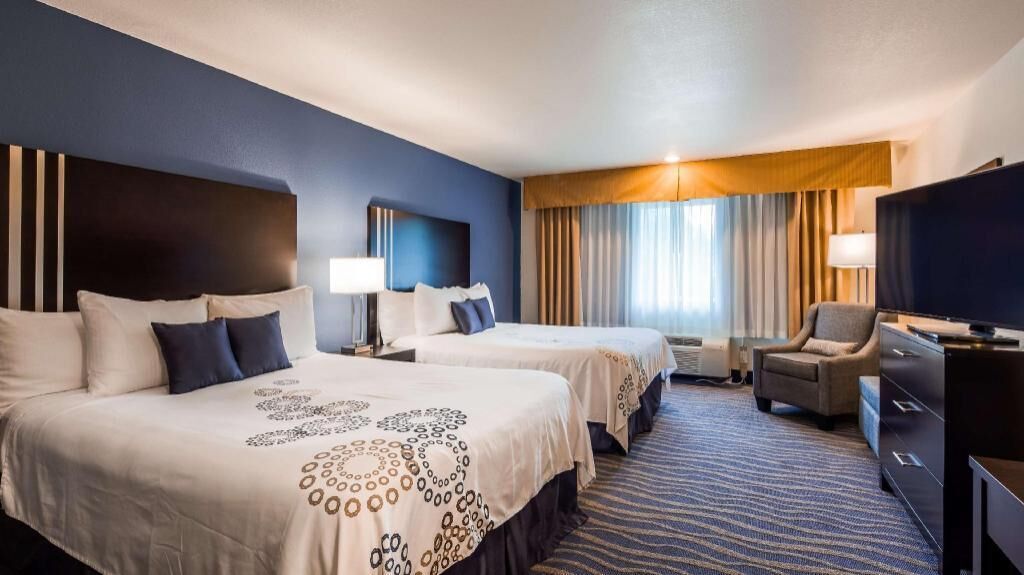 Premium bedding, pillowtop beds, desk, laptop workspace