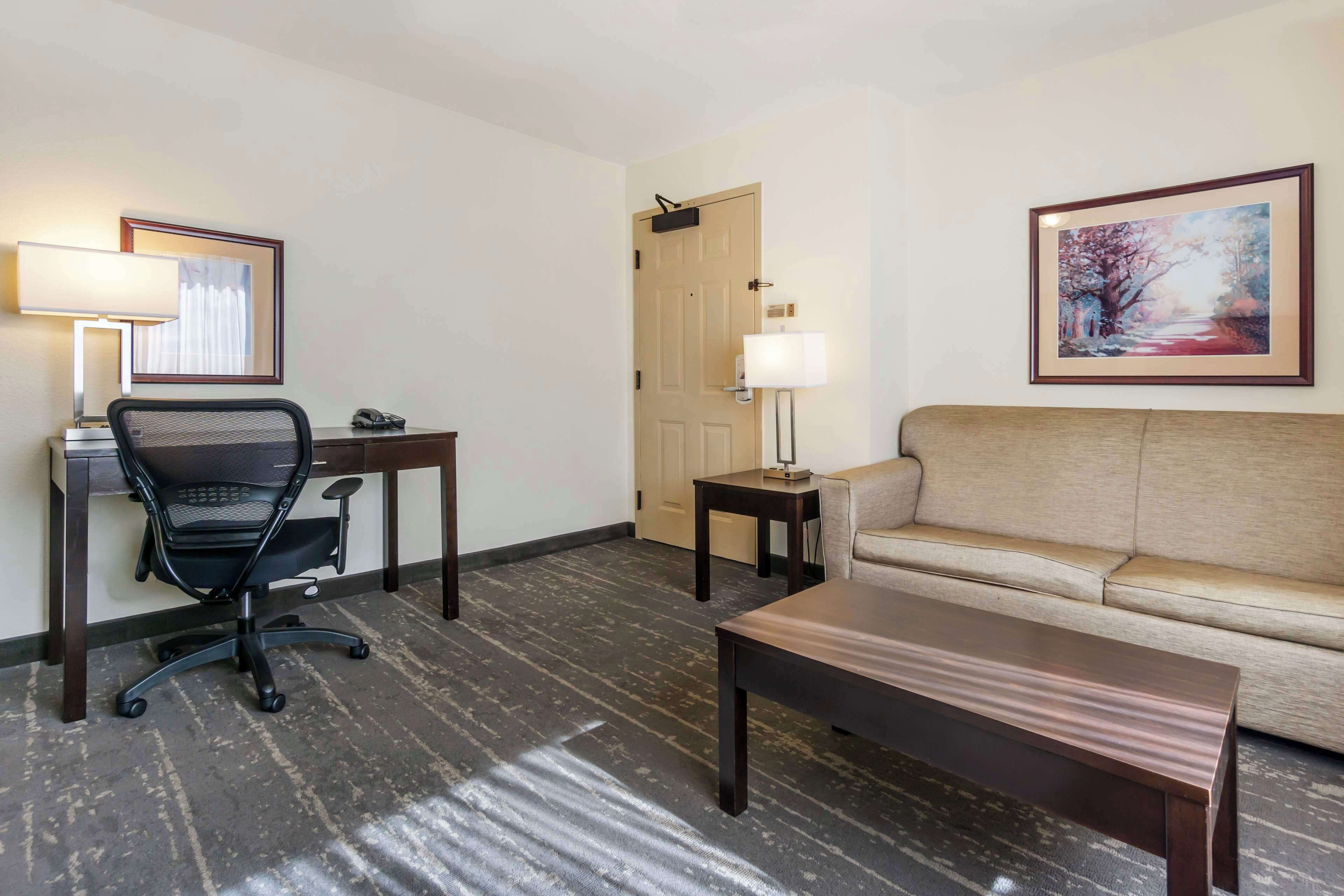 premium bedding, pillow-top beds, desk, blackout curtains