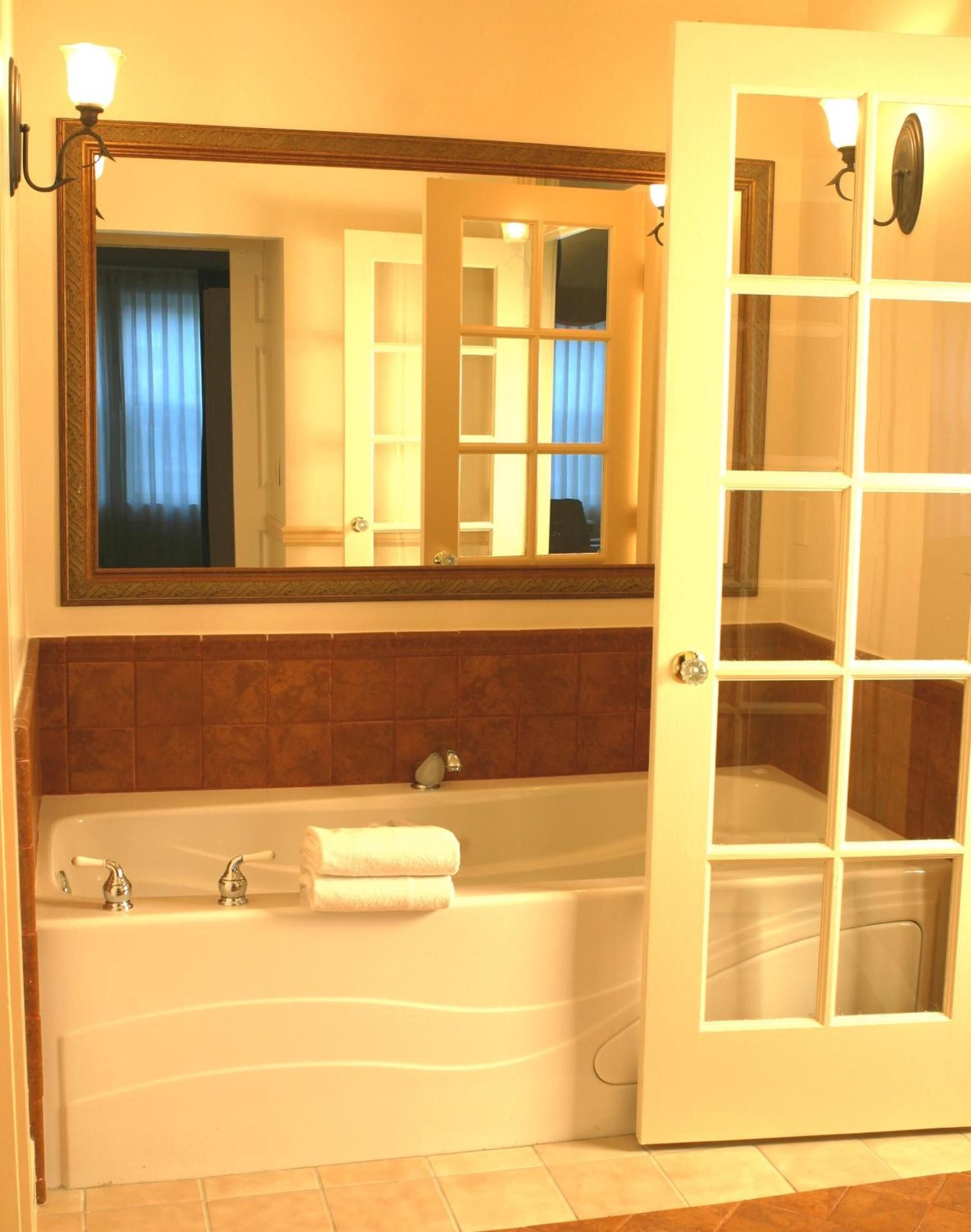 designer toiletries, hair dryer, bathrobes, towels