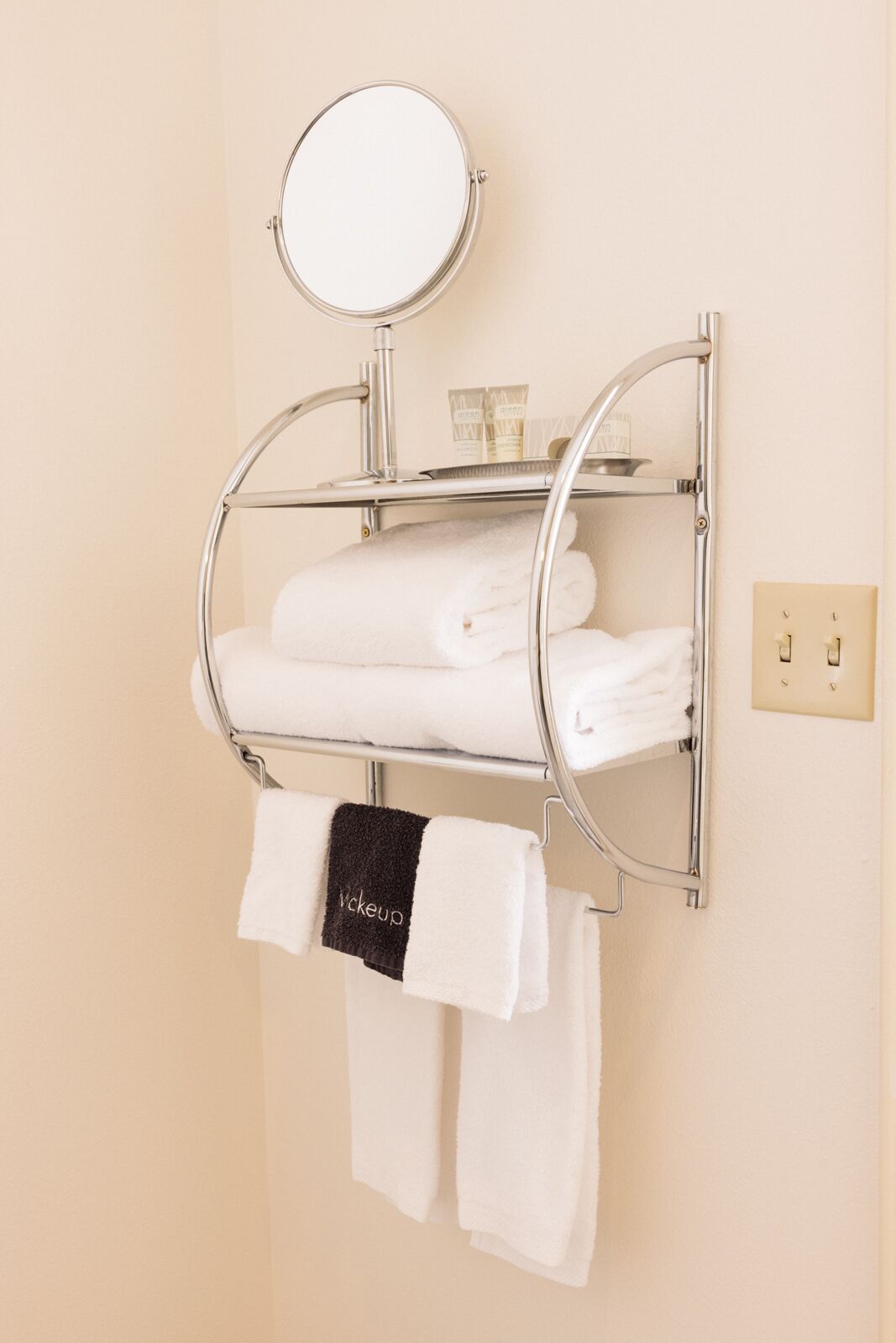 designer toiletries, hair dryer, bathrobes, towels