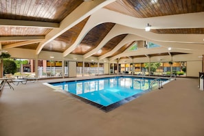 Indoor pool, open 6:00 AM to 11:00 PM, pool loungers