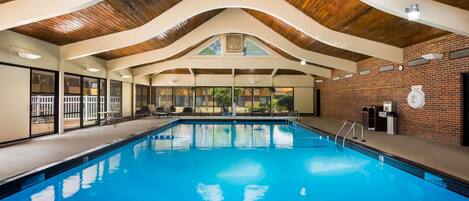 Indoor pool, open 6:00 AM to 11:00 PM, pool loungers