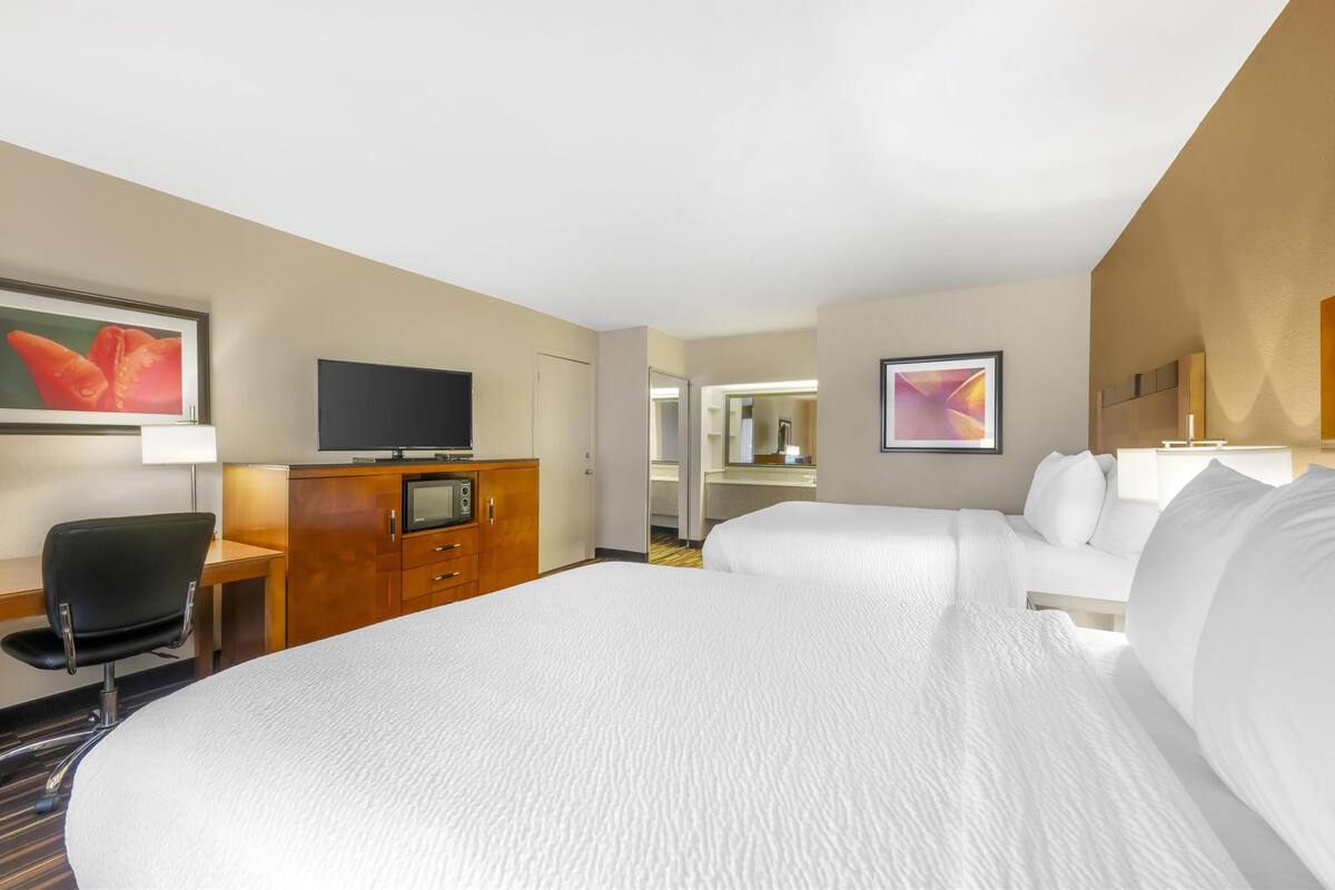 standard room, 2 queen beds, non smoking, refrigerator & microwave | pillow-top beds, in-room safe, desk, soundproofing