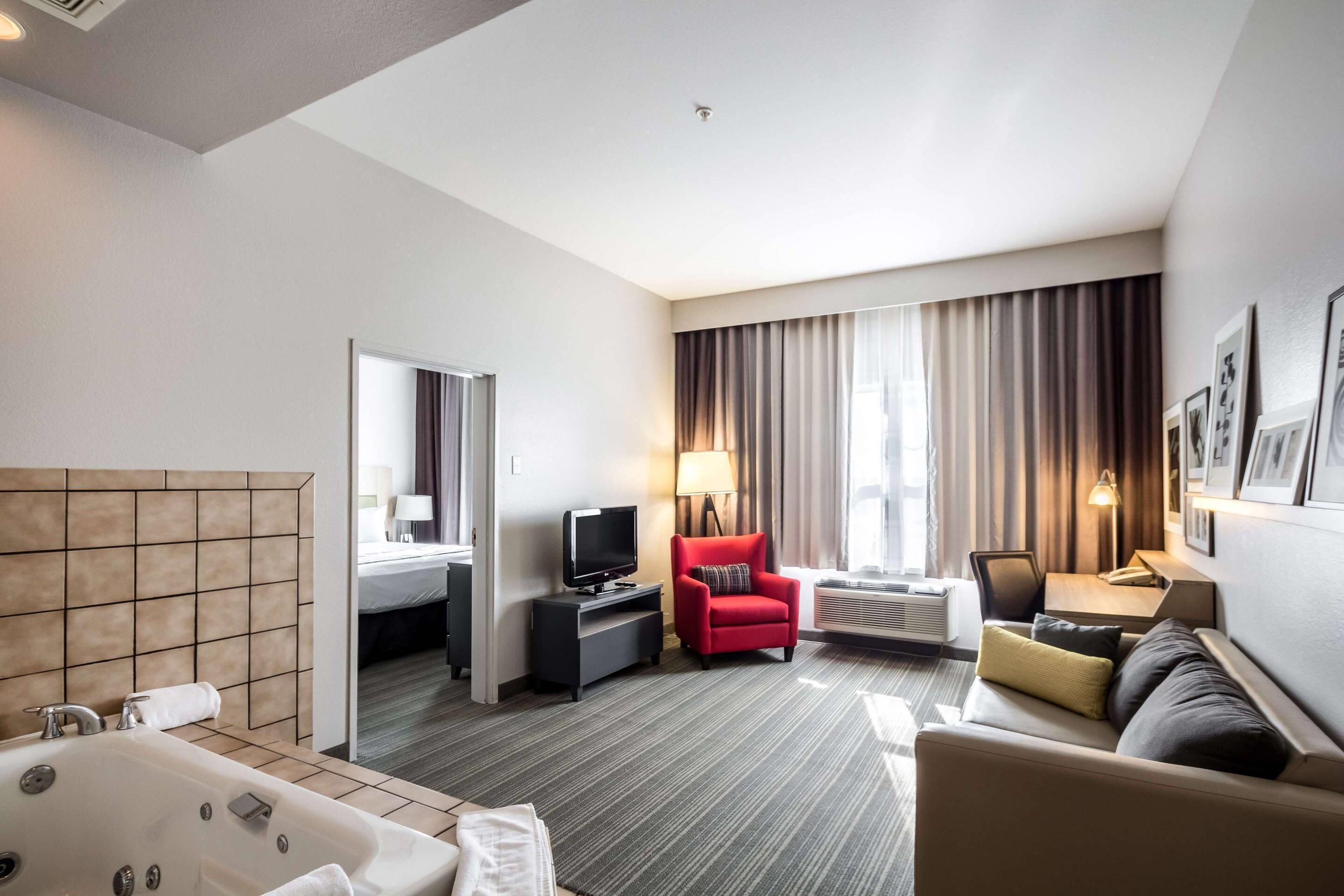 Suite, 1 King Bed with Sofa bed, Non Smoking | In-room safe, desk, blackout drapes, soundproofing
