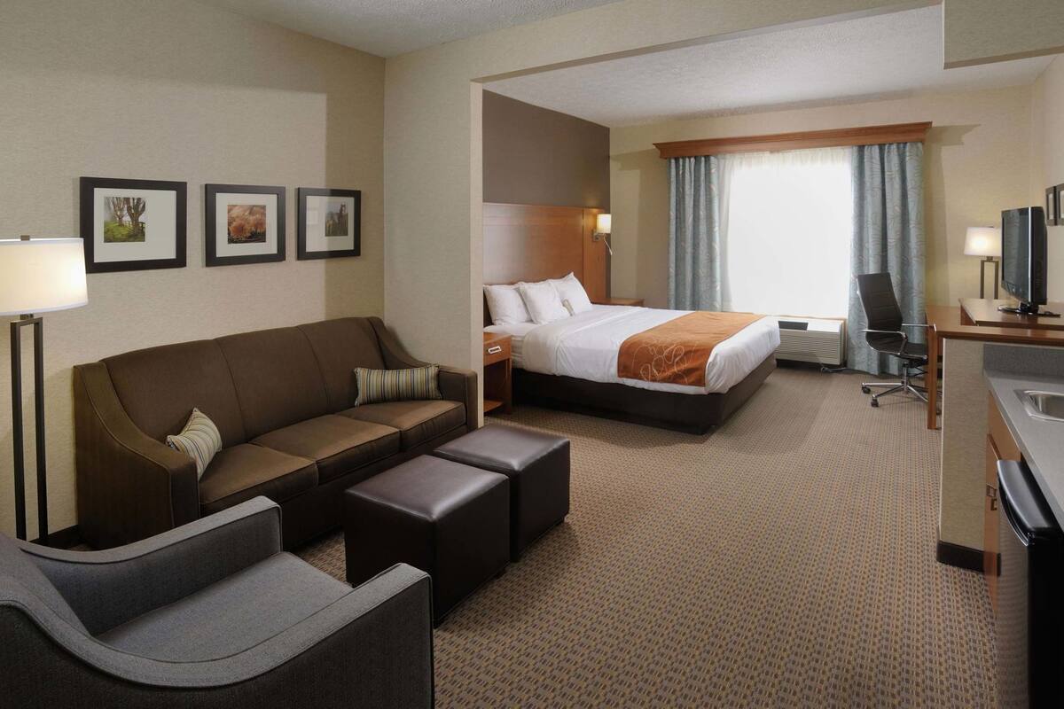 Premium bedding, laptop workspace, blackout curtains, soundproofing