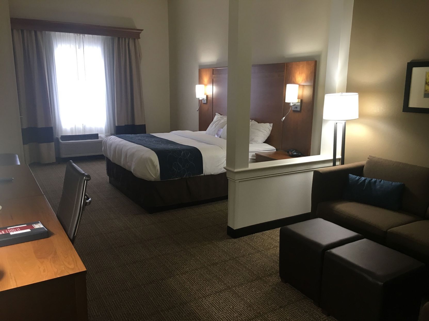 Premium bedding, laptop workspace, blackout curtains, soundproofing