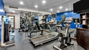 A modern gym with various exercise equipment, including treadmills and weight machines. - Holiday Inn Express Hotel & Suites El Centro by IHG (El Centro)