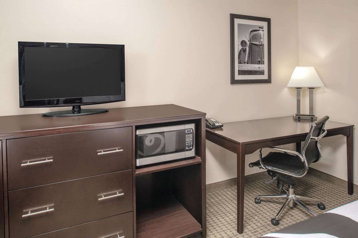 premium bedding, desk, blackout curtains, soundproofing