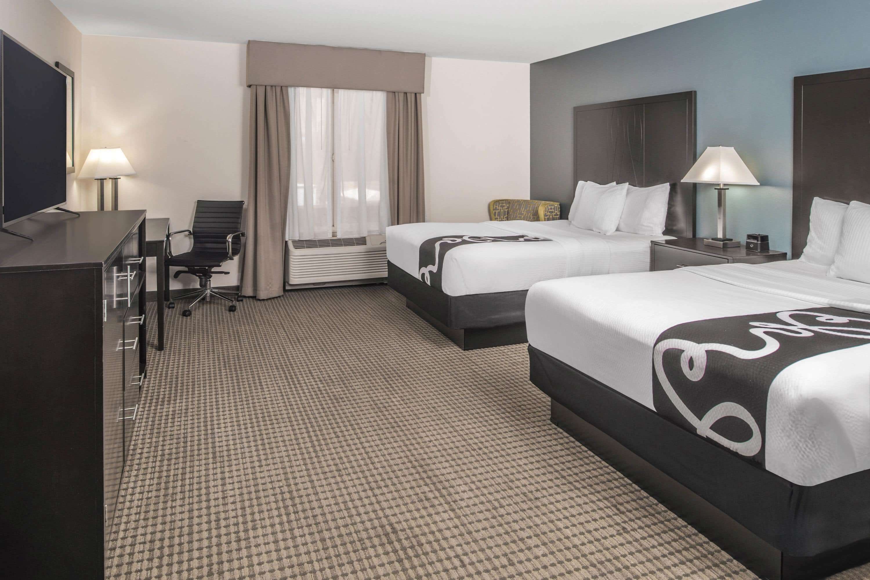 Premium bedding, desk, blackout drapes, soundproofing