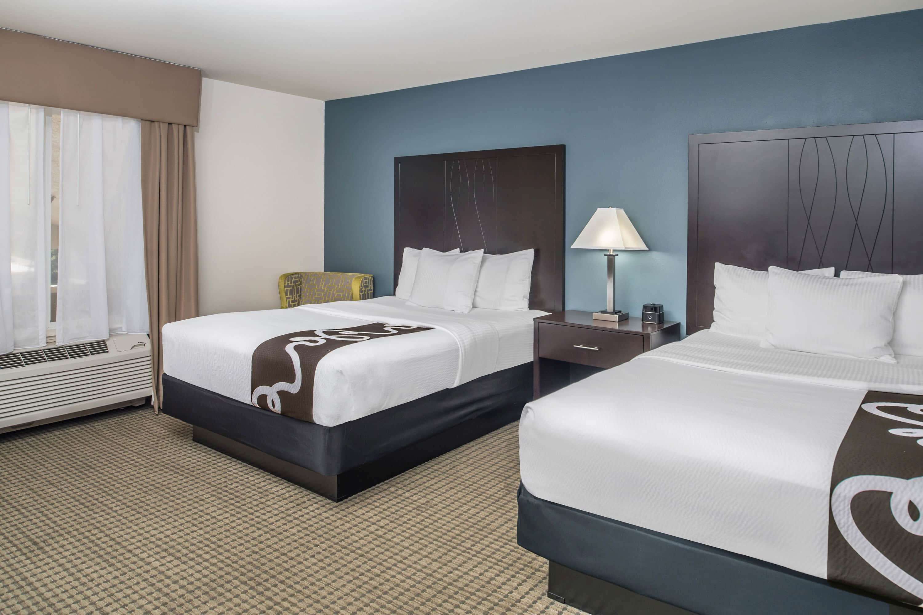 premium bedding, desk, blackout curtains, soundproofing