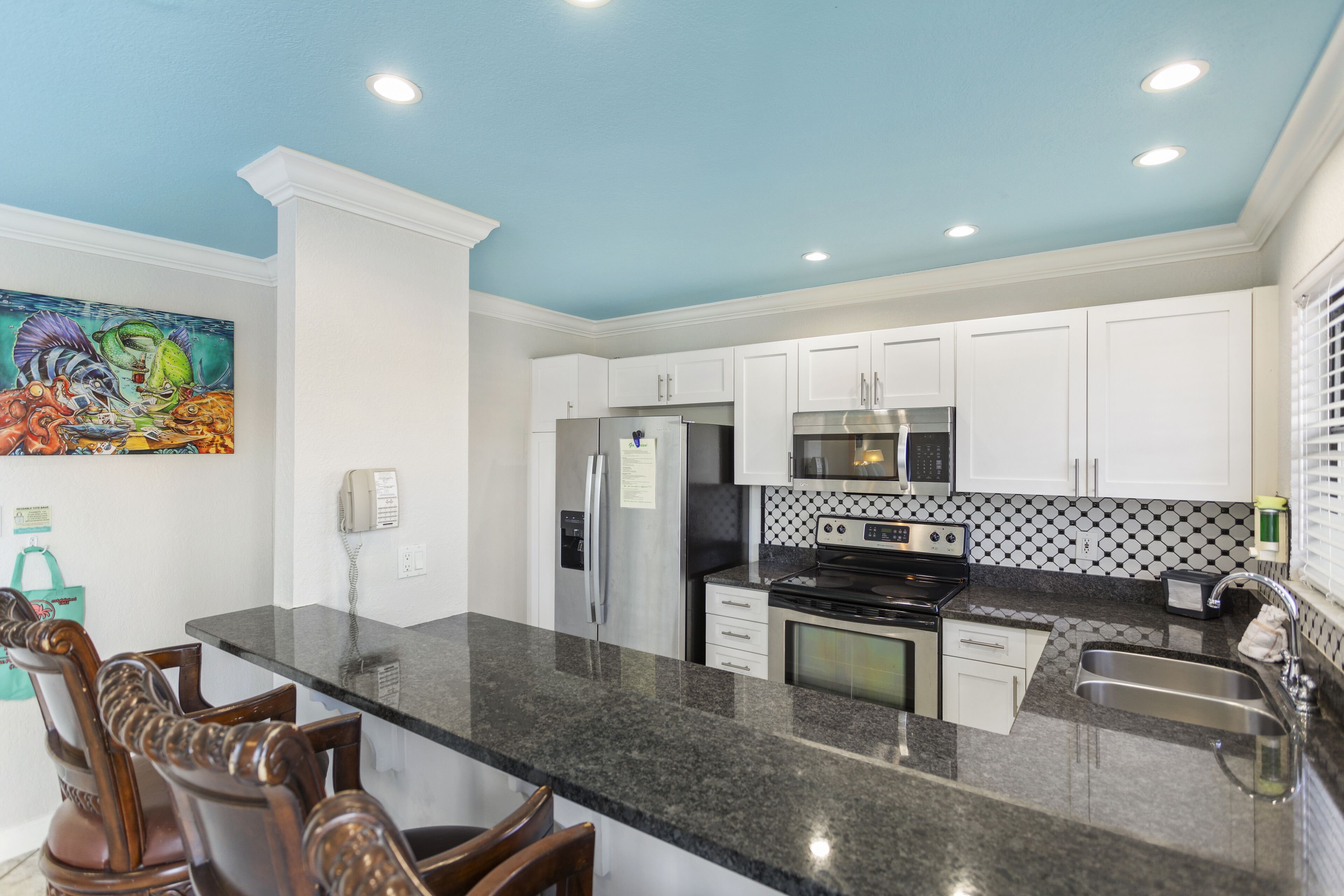 premium penthouse, multiple beds | private kitchen | full-sized fridge, microwave, stovetop, coffee/tea maker