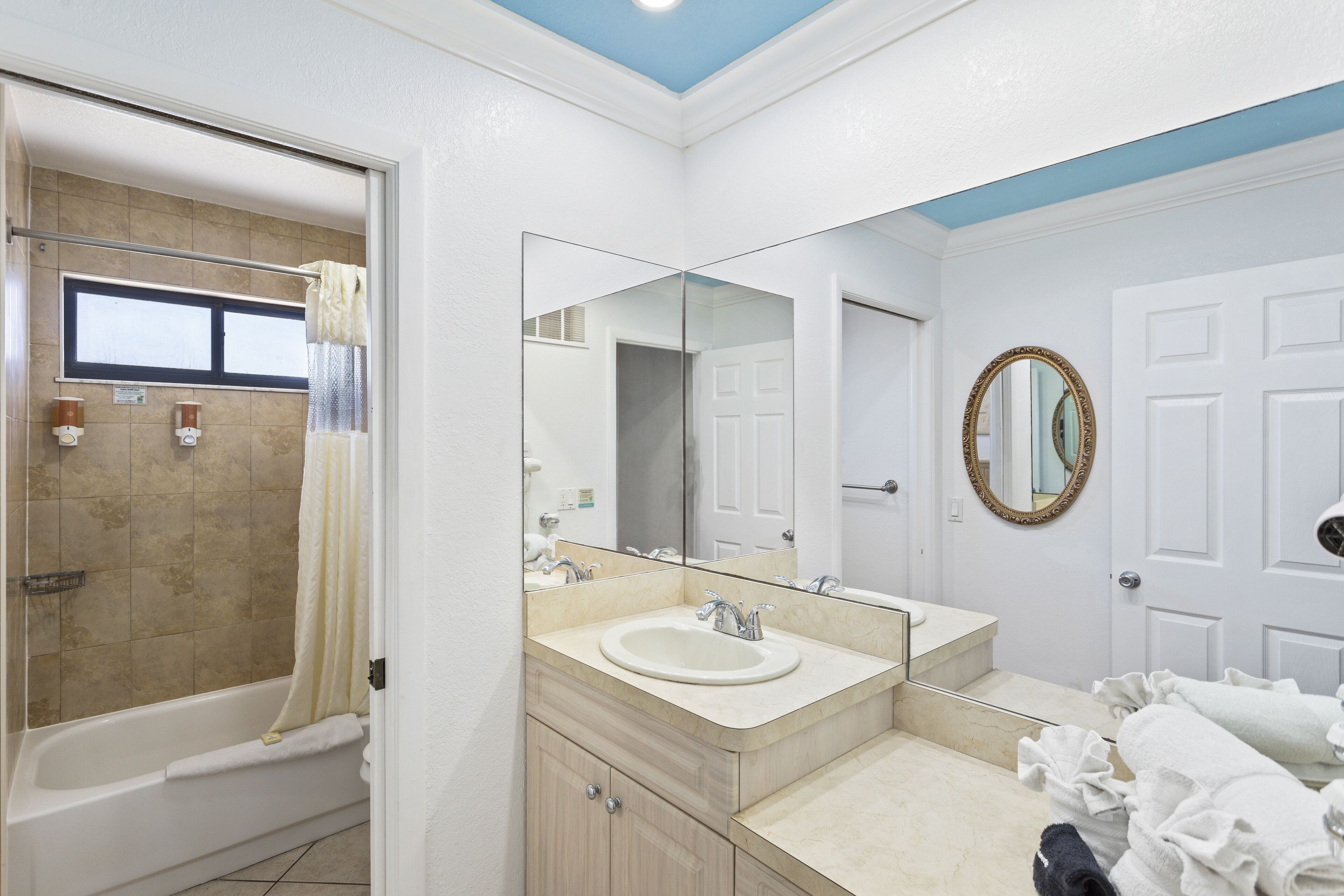 suite, 1 queen bed, balcony (bayfront) | bathroom | free toiletries, hair dryer, towels