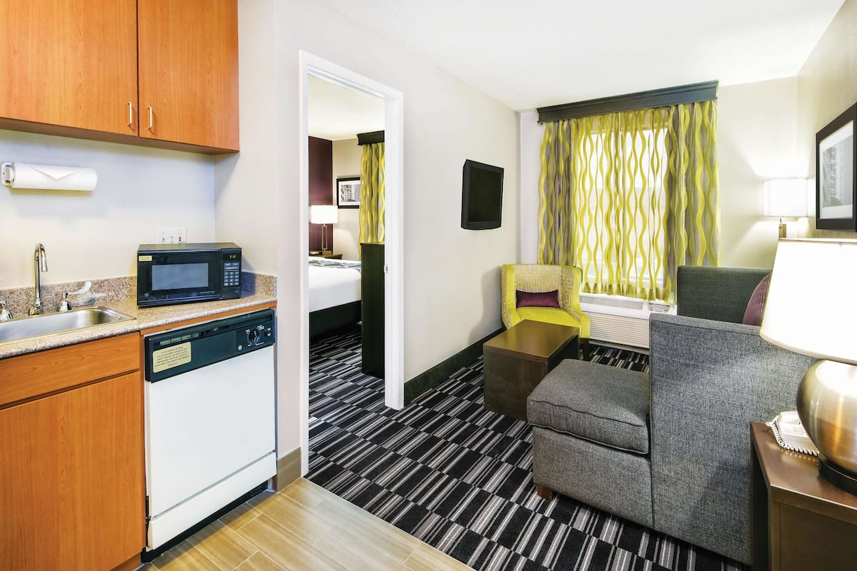 Suite, 1 King Bed, Non Smoking | Premium bedding, desk, laptop workspace, blackout drapes