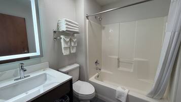 Standard Room, 1 King Bed, Non Smoking | Bathroom | Combined shower/tub, jetted tub, free toiletries, hair dryer