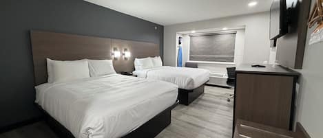 Standard Room, 2 Queen Beds, Non Smoking | In-room safe, desk, soundproofing, iron/ironing board