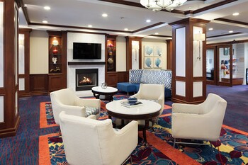 Sitting area in hotel lobby at The Atlantic Suites on the Ave