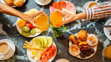 Daily buffet breakfast (EUR 13 per person)