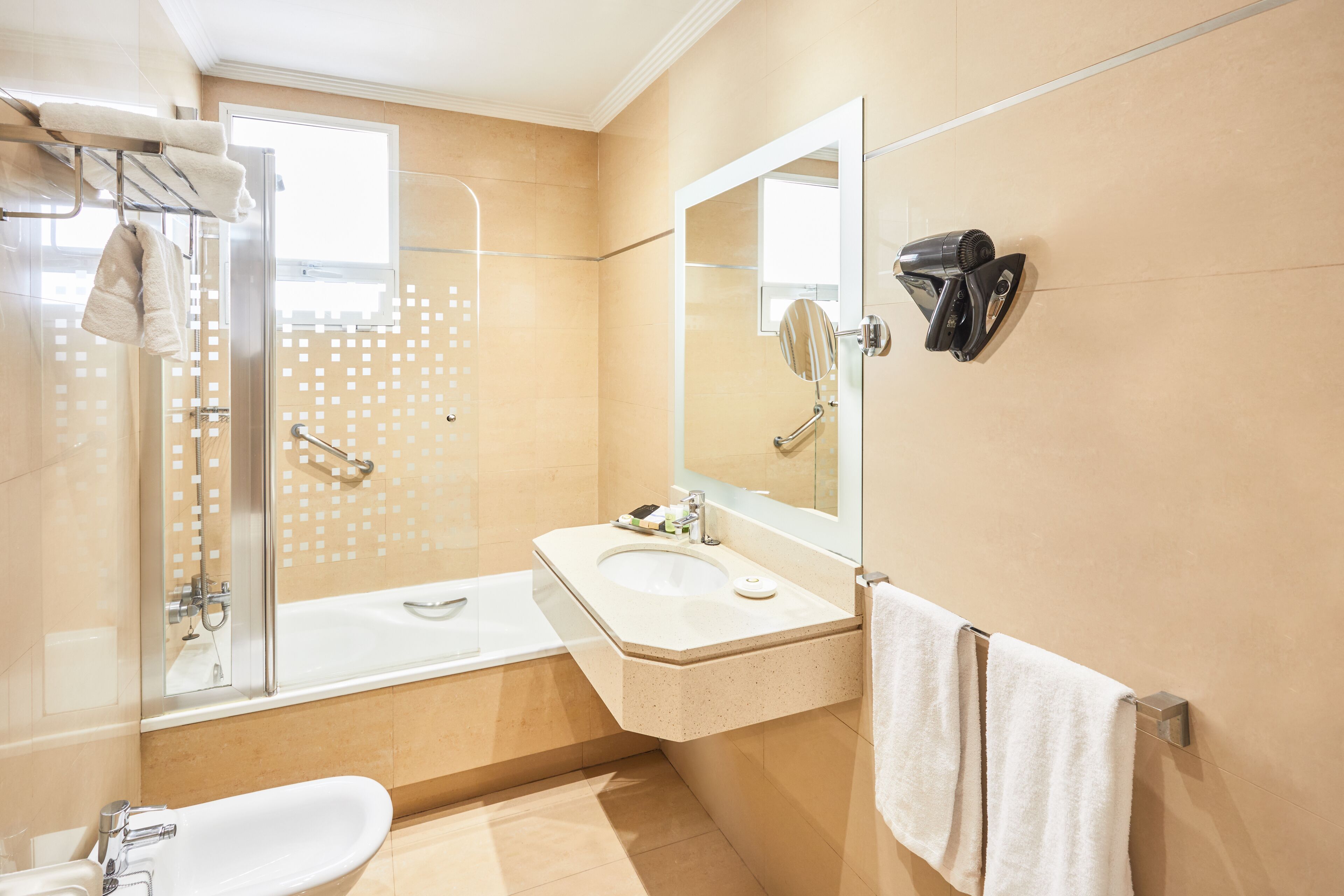 superior double room | bathroom | shower, free toiletries, hair dryer, towels