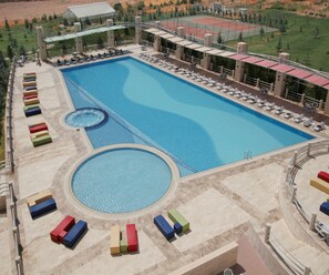 Indoor pool, seasonal outdoor pool, free pool cabanas, pool umbrellas