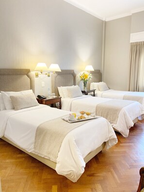 Triple Room, 3 Twin Beds | Premium bedding, in-room safe, individually decorated, desk