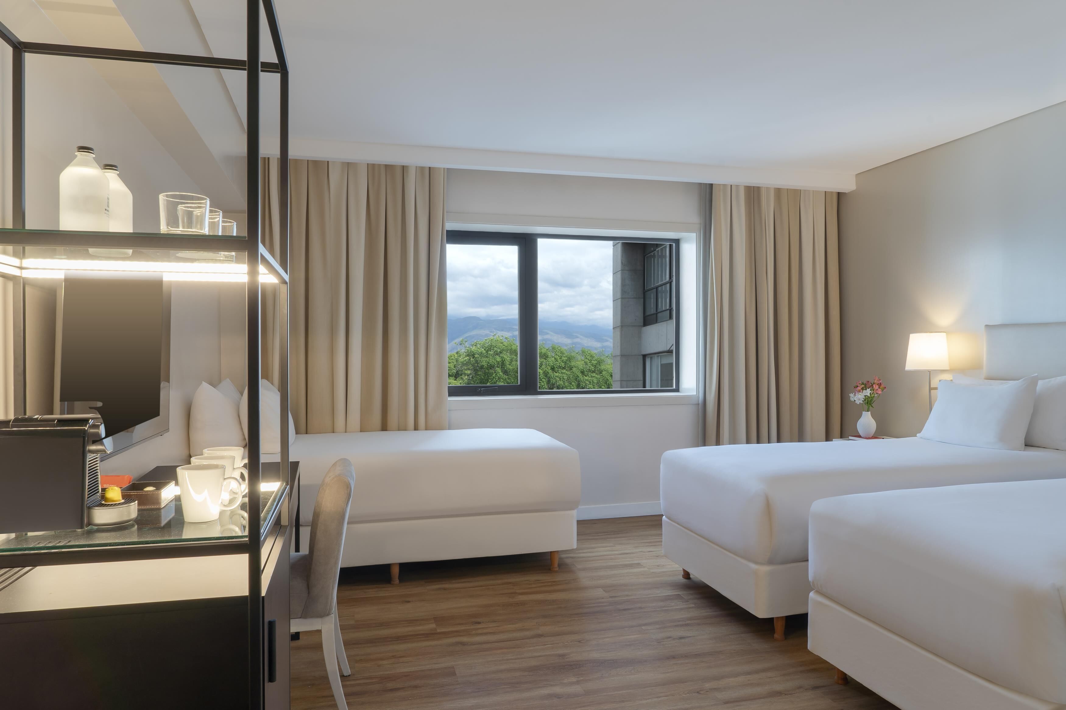 Family Triple Room | Premium bedding, down comforters, pillowtop beds, minibar