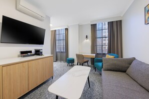 Executive Suite, 1 Bedroom - Newly Refurbished | Living area | LCD TV