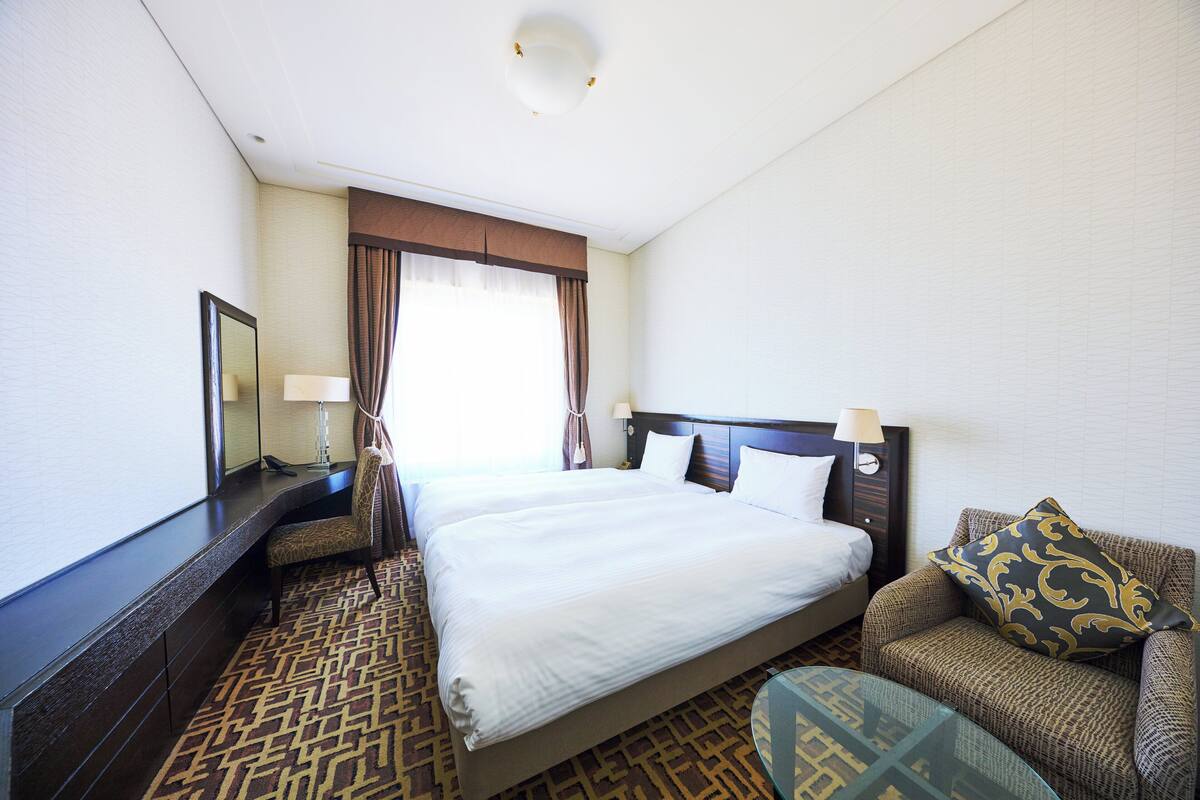 Standaard Twin kamer | Luxe beddengoed, een kluis op de kamer, een bureau, gratis wifi