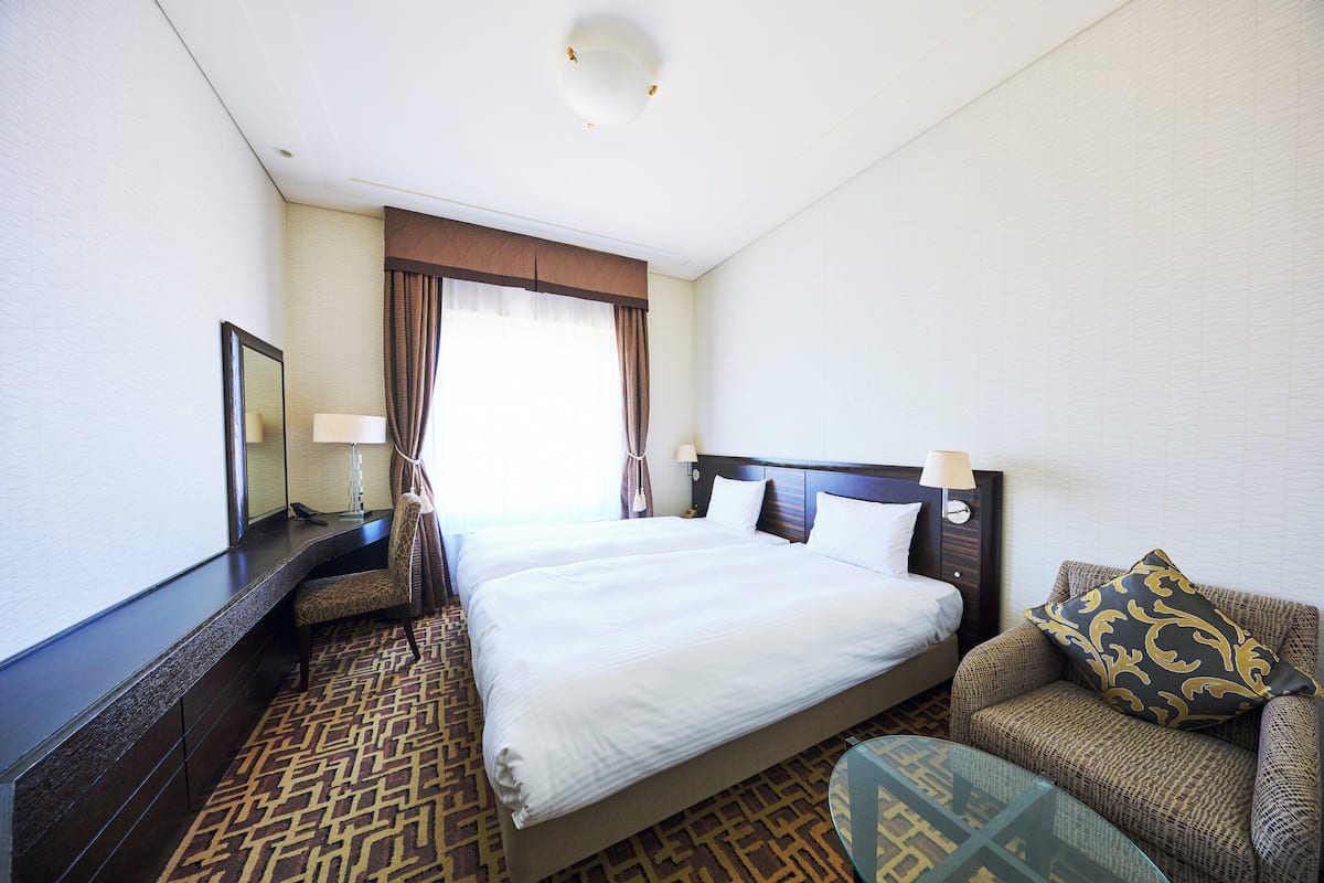 Kamar Twin Standar | Seprai premium, brankas, meja kerja, dan Wi-Fi gratis