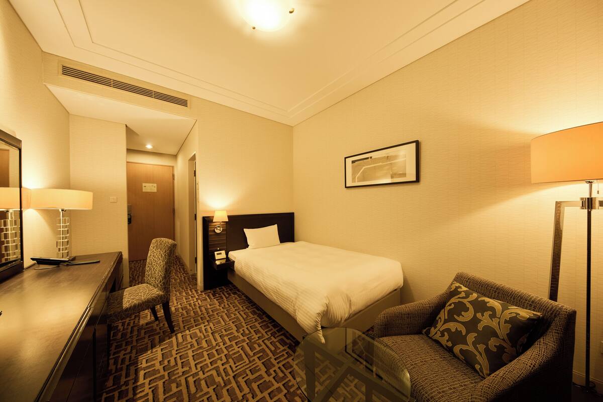 Luxe beddengoed, een kluis op de kamer, een bureau, gratis wifi