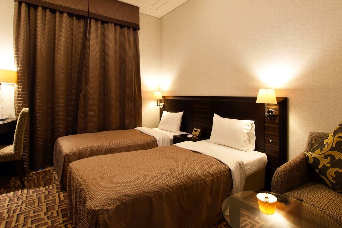 Luxe beddengoed, een kluis op de kamer, een bureau, gratis wifi