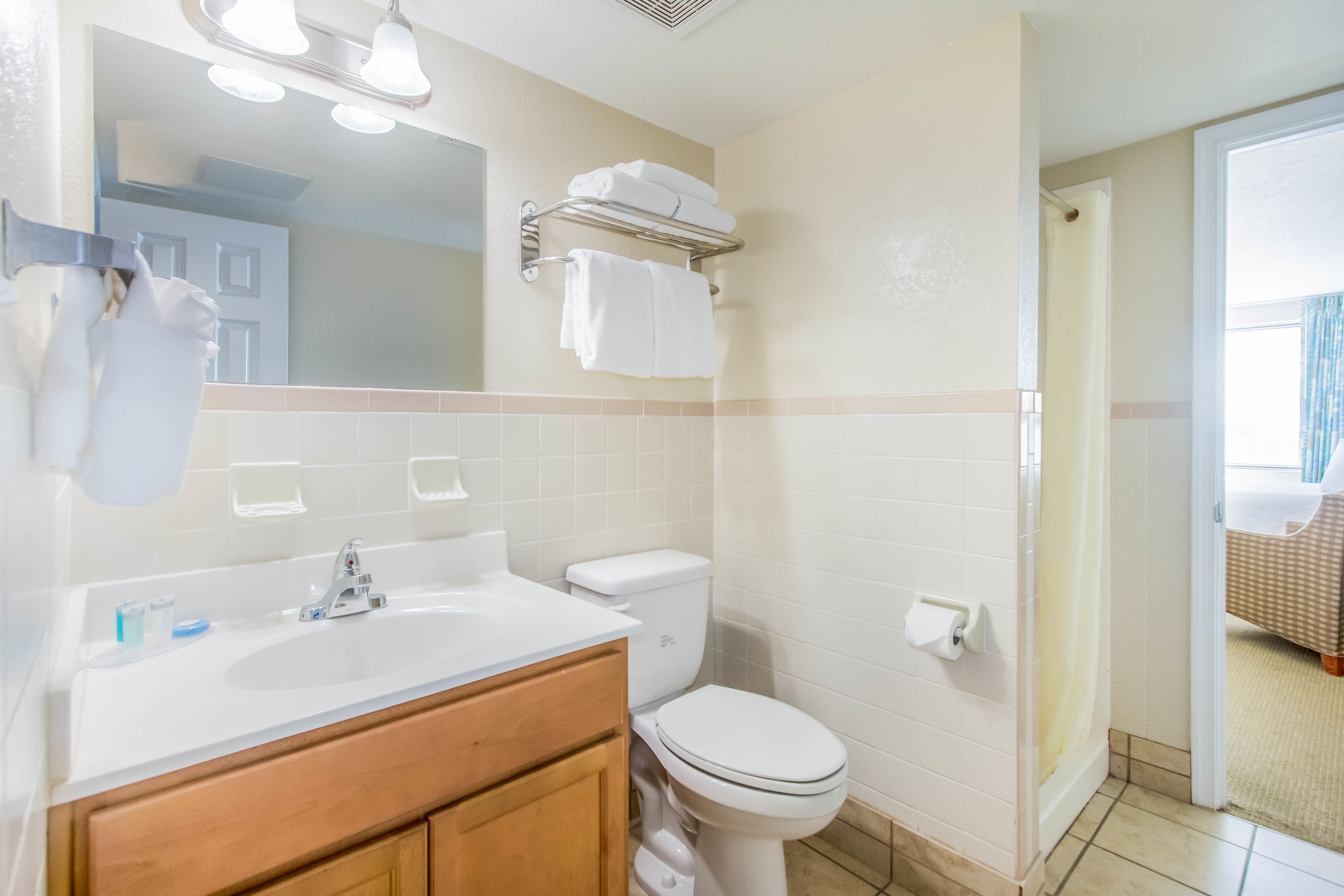 Two Queen Two Room Gulf Front-Non Smoking | Bathroom | Eco-friendly toiletries, hair dryer, towels