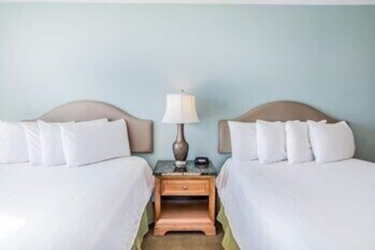 Premium bedding, blackout drapes, iron/ironing board, free WiFi