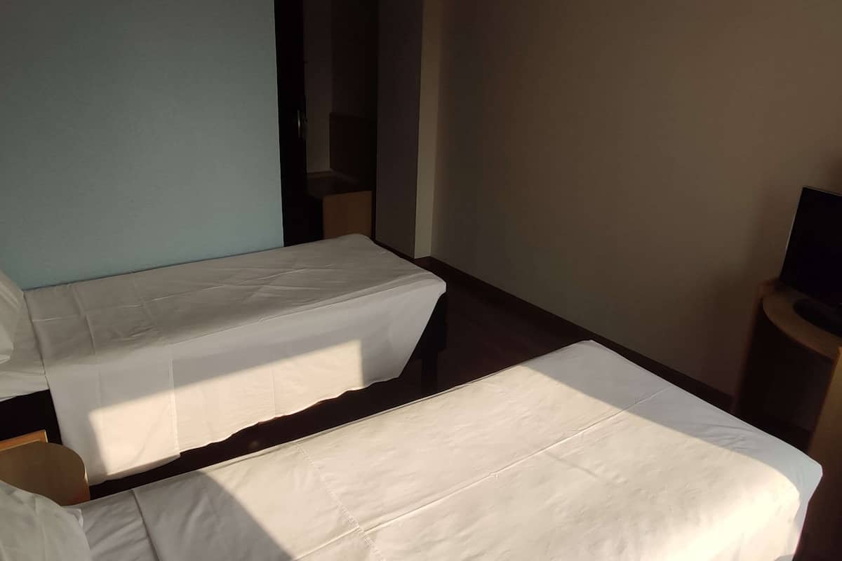 Standard Triple Room, 3 Single Beds | 1 bedroom, minibar, in-room safe, desk